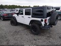 2012 Jeep Wrangler Unlimited — photo 3 of 16 | VIN 1C4BJWFG3CL278018