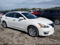 2015 Nissan Altima — photo 1 of 11 | VIN 1N4AL3APXFC105747