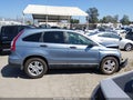 2011 Honda CR-V — photo 13 of 16 | VIN 5J6RE3H55BL055551