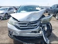 2013 Honda CR-V — photo 12 of 16 | VIN 2HKRM4H52DH657104