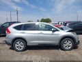 2013 Honda CR-V — photo 13 of 16 | VIN 2HKRM4H52DH657104