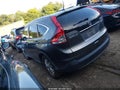 2012 Honda CR-V — photo 14 of 16 | VIN JHLRM4H73CC023945