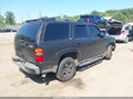2004 Chevrolet Tahoe — photo 4 of 16 | VIN 1GNEK13Z94R138919