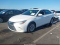 2016 Toyota Camry Hybrid — photo 2 of 17 | VIN 4T1BD1FK8GU184906