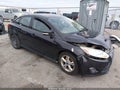 2014 Ford Focus — photo 13 of 16 | VIN 1FADP3F22EL204902