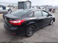 2014 Ford Focus — photo 4 of 16 | VIN 1FADP3F22EL204902
