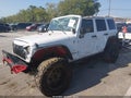 2015 Jeep Wrangler Unlimited — photo 2 of 17 | VIN 1C4BJWEG2FL610360