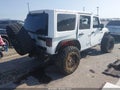 2015 Jeep Wrangler Unlimited — photo 4 of 17 | VIN 1C4BJWEG2FL610360