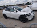 2026 Tesla Model Y — photo 11 of 14 | VIN 7SAYGDED4TA493656
