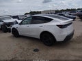 2026 Tesla Model Y — photo 12 of 14 | VIN 7SAYGDED4TA493656