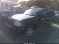 2008 Jeep Grand Cherokee — photo 2 of 11 | VIN 1J8GR48K08C136908