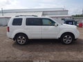 2014 Honda Pilot — photo 13 of 16 | VIN 5FNYF4H67EB057581