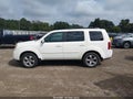 2014 Honda Pilot — photo 14 of 16 | VIN 5FNYF4H67EB057581