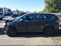 2013 Honda CR-V — photo 14 of 16 | VIN 5J6RM4H35DL085613