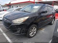 2014 Hyundai Tucson — photo 2 of 16 | VIN KM8JT3AF8EU851068