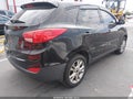 2014 Hyundai Tucson — photo 4 of 16 | VIN KM8JT3AF8EU851068