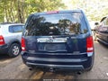 2011 Honda Pilot — photo 16 of 17 | VIN 5FNYF4H5XBB072403