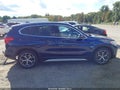 2017 BMW X1 — photo 13 of 18 | VIN WBXHT3C34H5F81816