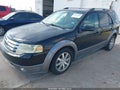 2009 Ford Taurus — photo 2 of 11 | VIN 1FMDK02W19GA02269