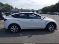 2023 Tesla Model Y — photo 11 of 14 | VIN 7SAYGDEE3PA128030