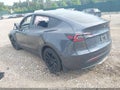 2023 Tesla Model Y — photo 3 of 15 | VIN 7SAYGAEE0PF932240