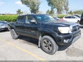 2014 Toyota Tacoma — photo 1 of 18 | VIN 3TMJU4GN1EM165660