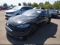 2014 Tesla Model S — photo 2 of 18 | VIN 5YJSA1H25EFP62993