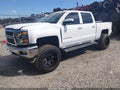 2015 Chevrolet Silverado 1500 — photo 2 of 15 | VIN 3GCUKREC0FG127743