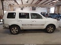 2011 Honda Pilot — photo 14 of 17 | VIN 5FNYF3H56BB006862