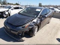 2021 Toyota Prius — photo 2 of 16 | VIN JTDKAMFUXM3133795