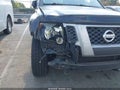 2015 Nissan Xterra — photo 6 of 16 | VIN 5N1AN0NW2FN656064