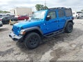 2021 Jeep Wrangler Unlimited — photo 2 of 16 | VIN 1C4HJXDN3MW738862