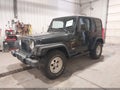 1999 Jeep Wrangler — photo 2 of 11 | VIN 1J4FY19S7XP402171