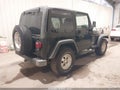 1999 Jeep Wrangler — photo 4 of 11 | VIN 1J4FY19S7XP402171