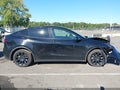 2024 Tesla Model Y — photo 12 of 15 | VIN 7SAYGAEE0RF069944