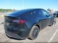 2024 Tesla Model Y — photo 4 of 15 | VIN 7SAYGAEE0RF069944