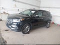 2018 Hyundai Santa Fe — photo 2 of 16 | VIN 5NMZUDLB5JH062396