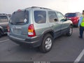 2003 Mazda Tribute — photo 4 of 14 | VIN 4F2YZ04143KM12443