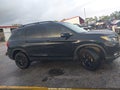 2024 Honda Passport — photo 13 of 16 | VIN 5FNYF8H83RB023975