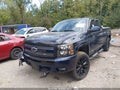2011 Chevrolet Silverado 1500 — photo 2 of 15 | VIN 1GCRKSE31BZ216082