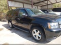 2013 Chevrolet Suburban 1500 — photo 13 of 16 | VIN 1GNSCKE06DR117952