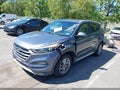 2018 Hyundai Tucson — photo 2 of 16 | VIN KM8J3CA48JU669248