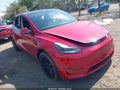 2023 Tesla Model Y — photo 1 of 15 | VIN 7SAYGDEE9PF894430