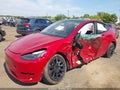2023 Tesla Model Y — photo 6 of 15 | VIN 7SAYGDEE9PF894430