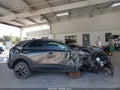 2024 Mazda CX-30 — photo 13 of 16 | VIN 3MVDMBBM5RM634544