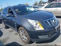 2013 Cadillac SRX — photo 1 of 12 | VIN 3GYFNCE3XDS537046