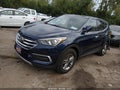 2018 Hyundai Santa Fe — photo 2 of 16 | VIN 5XYZTDLB2JG562139