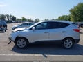 2011 Hyundai Tucson — photo 14 of 16 | VIN KM8JU3AC0BU137918