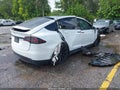 2023 Tesla Model X — photo 4 of 16 | VIN 7SAXCAE55PF366342