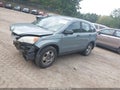 2011 Honda CR-V — photo 2 of 16 | VIN 5J6RE4H38BL034486
